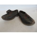 Pair of early child's clogs