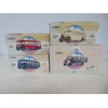 Collection of 4 boxed Corgi coaches