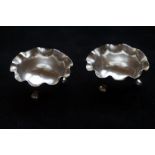2 small silver bowls