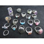 Collection of silver rings and others
