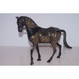 Brass engraved horse