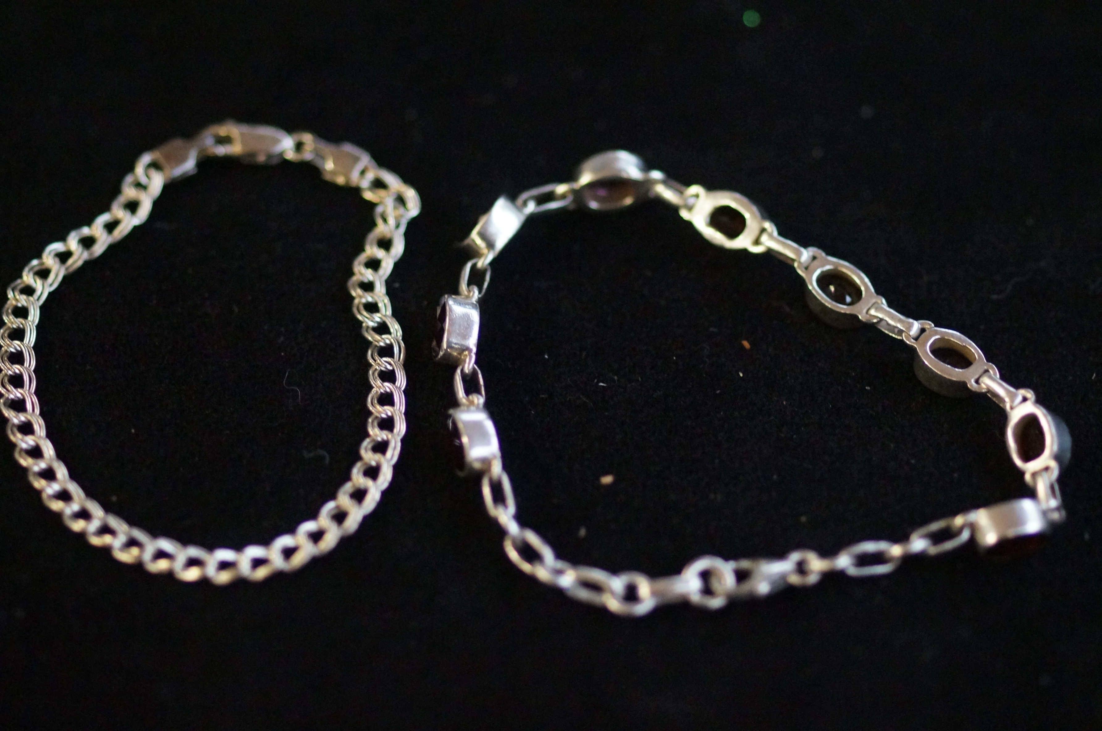 2 silver bracelets