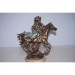 A large resin horse and rider on a marble base- 38