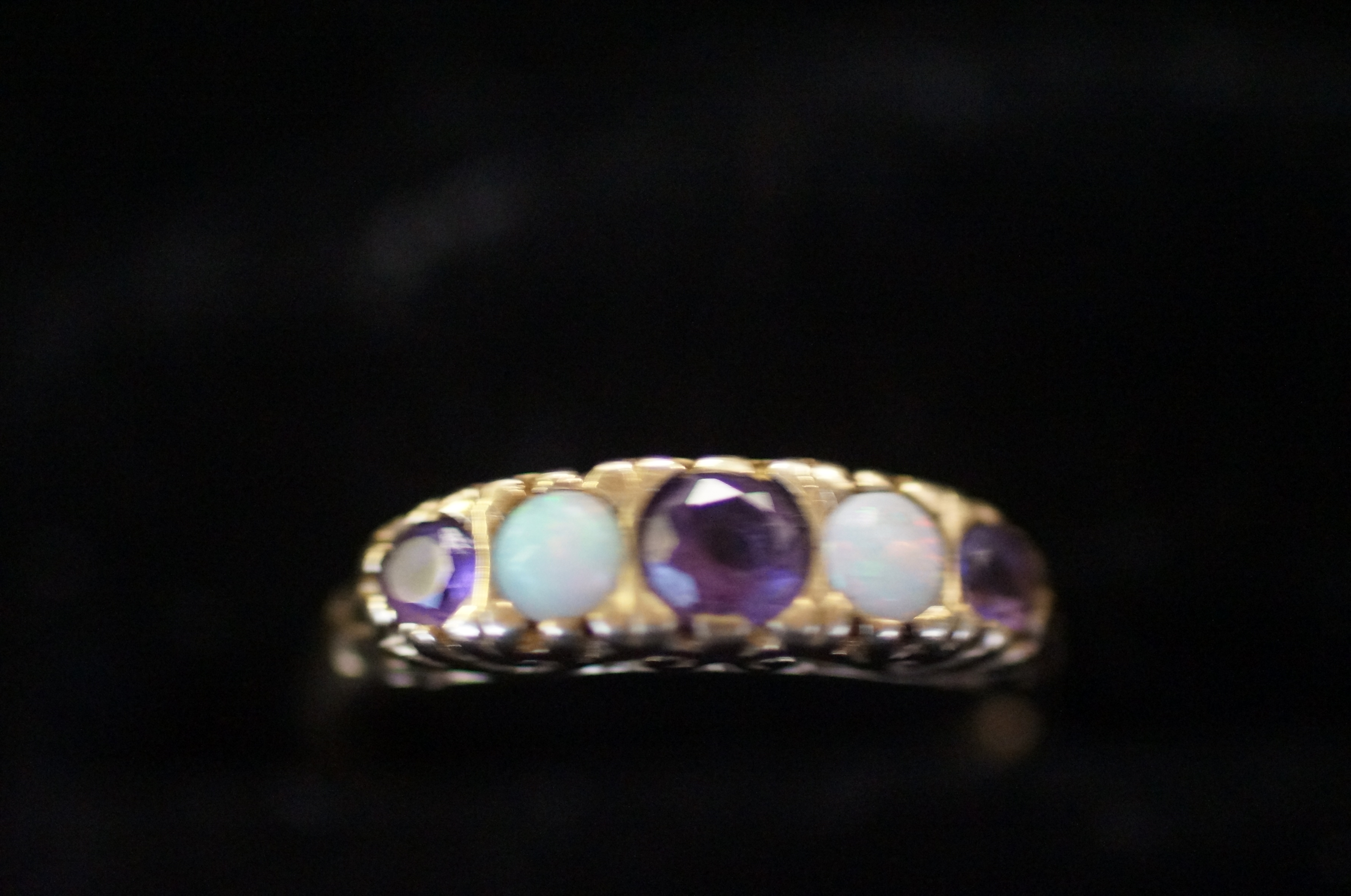 9ct gold ring set with purple and opal stones- siz