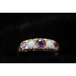 9ct gold ring set with purple and opal stones- siz