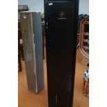 A Aukmont metal gun safe with integral ammo safe -