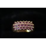 9ct gold ring set with pink stones- size R