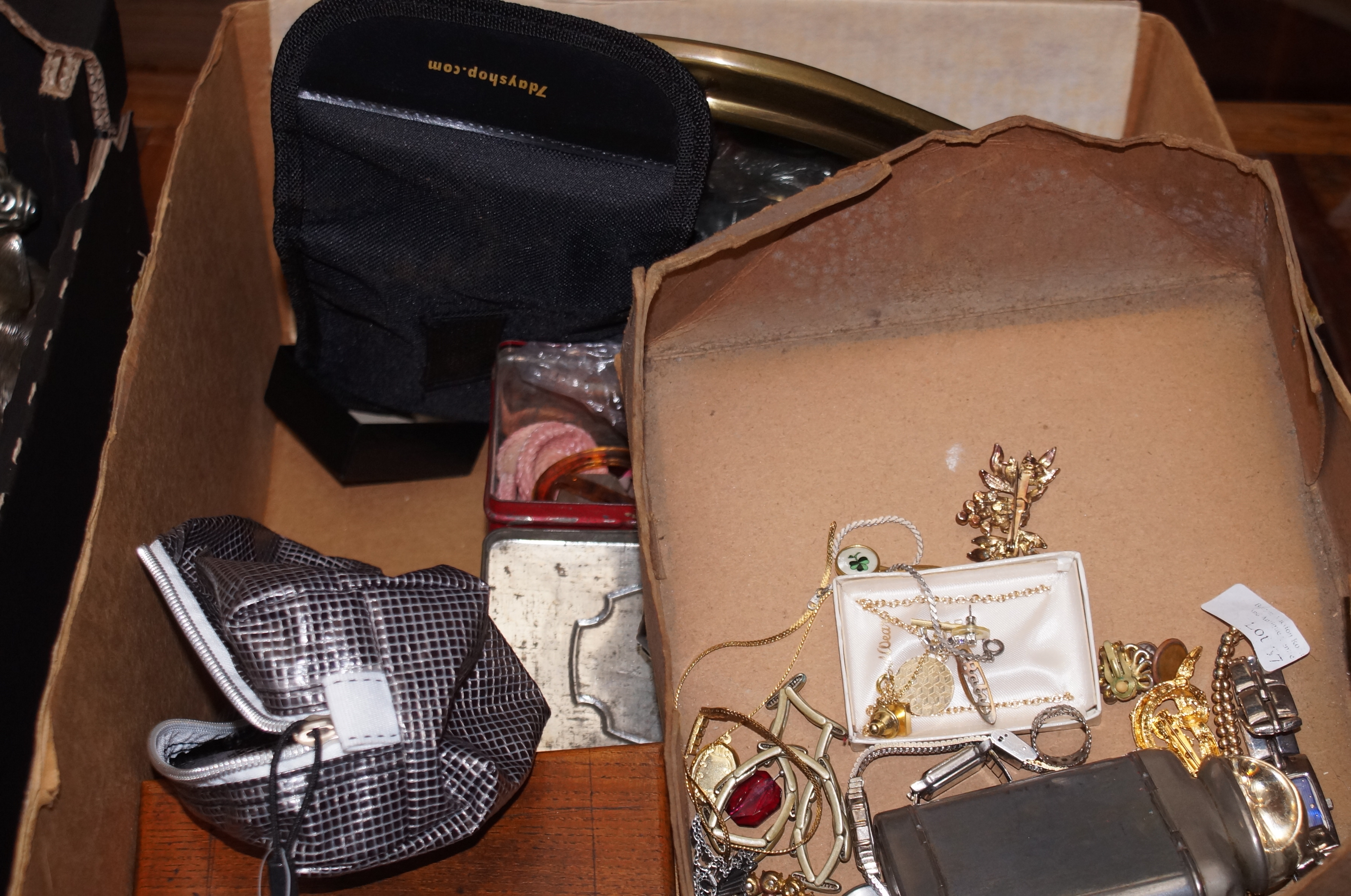 A box of costume jewellery to include binoculars