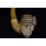 bone and amber ornate pipe