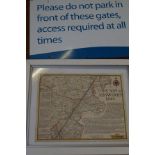 Reproduction map together with a parking sign