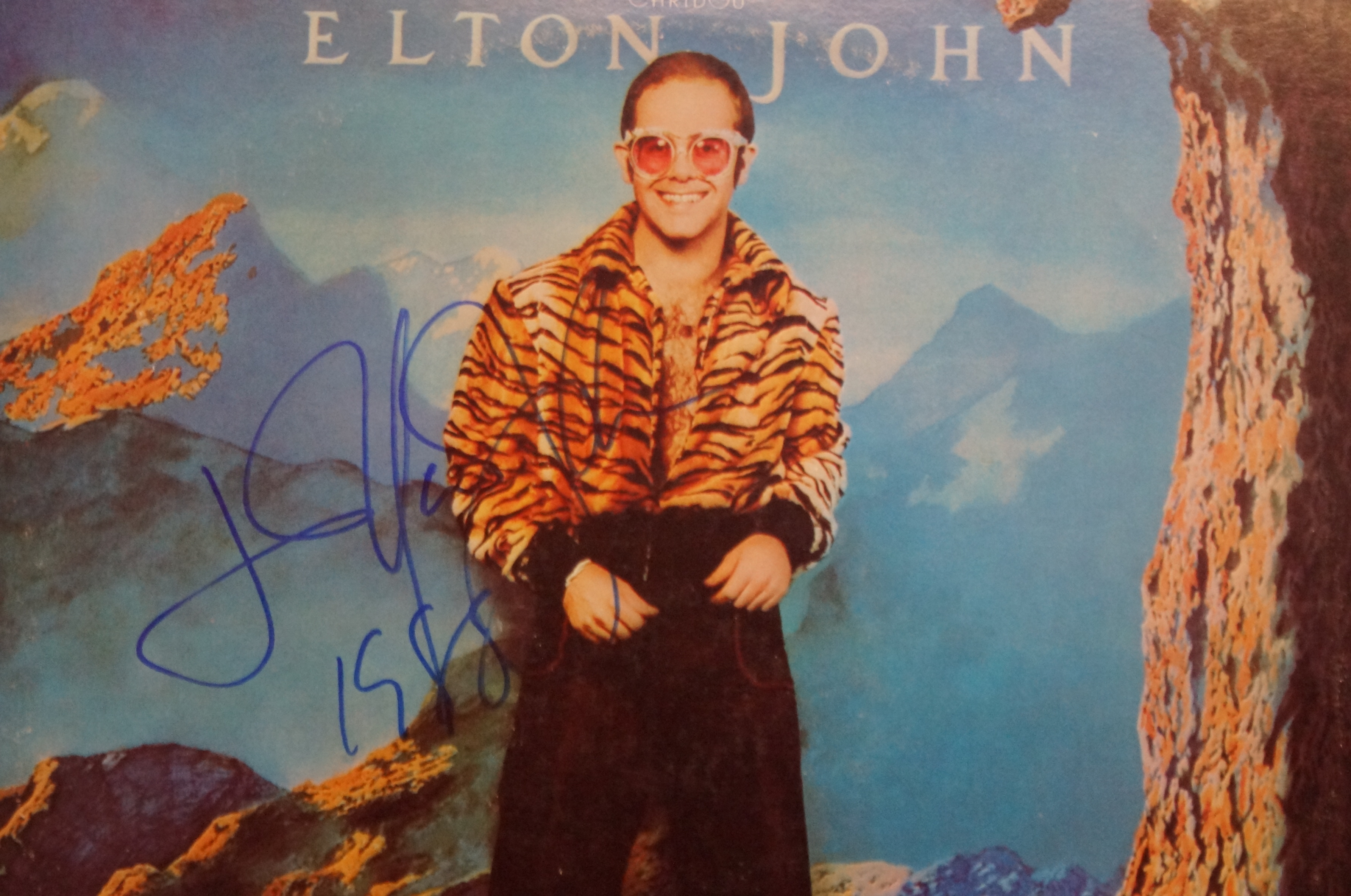 Elton John signed Caribou album. Signed in blue ma