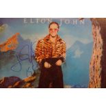 Elton John signed Caribou album. Signed in blue ma