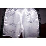 Boxing shorts signed by six boxing legends and cha