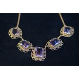 A 5 stone Amethyst necklace, each mounted individu