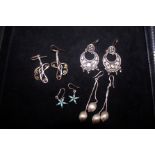 4 Pairs of Silver Earrings