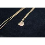 9ct Gold Pendant (Hoover) Suspended on a Gilt Ment