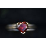 9ct white gold ring set with red heart stone