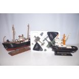 Two model Trawlers together with two model Aeropla