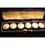 Case Set of Silver Buttons