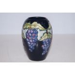 Moorcroft trainee vase decorated with grapes 14cm