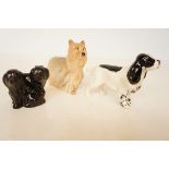 Three Beswick Dog Studies to include rare black Pu