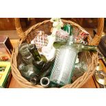 Basket of early Glass Bottles and Glass and Cerami