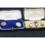 Silver cased button set and two others