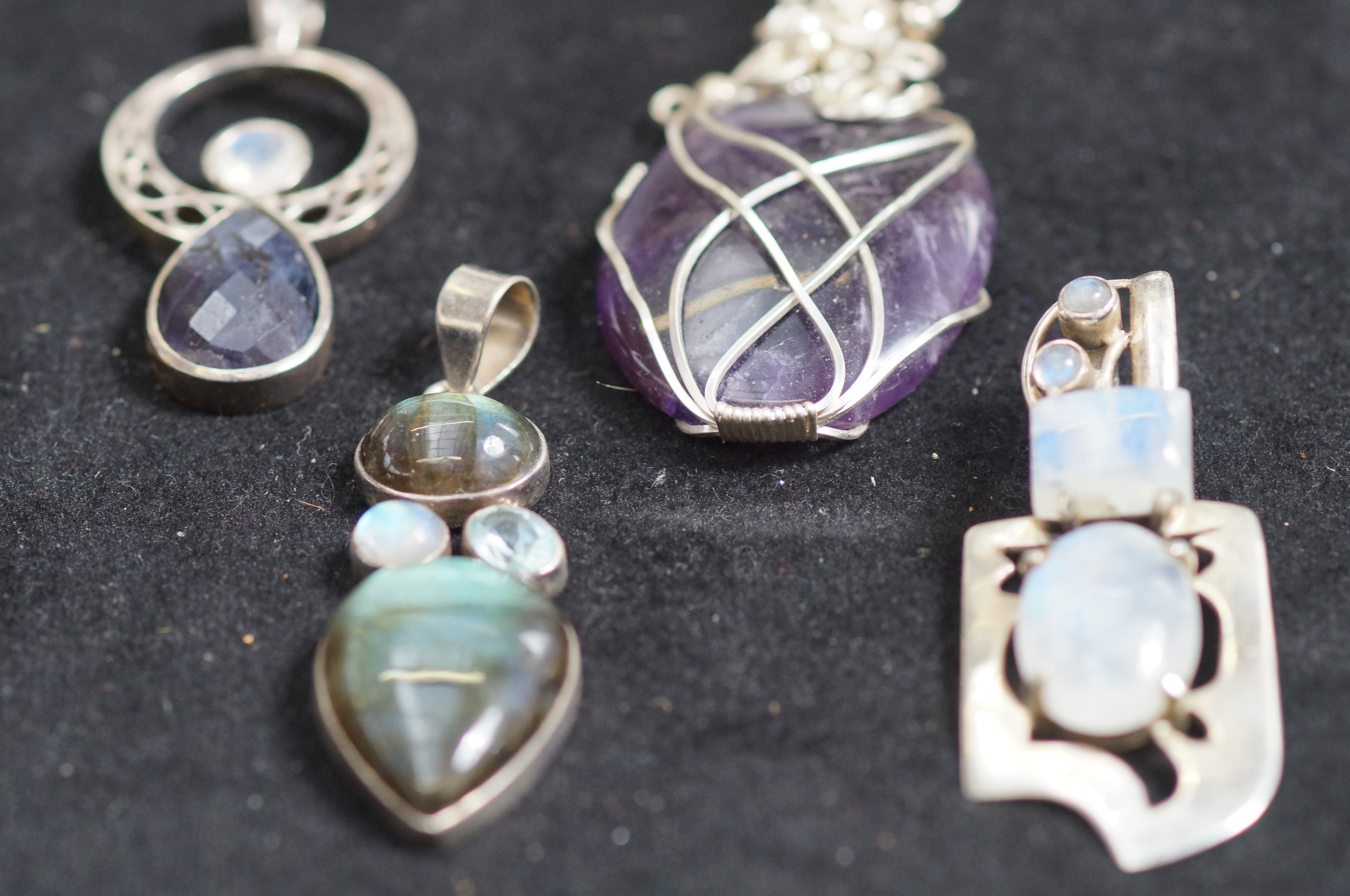 4x Silver and Glass Pendants