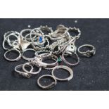 Large Collection of White Metal Rings