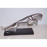 Large chrome jaguar mascot on base