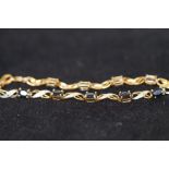 9ct gold bracelet with sapphire and diamonds