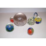 Seven Paperweights