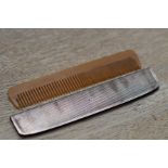 Silver comb holder and comb