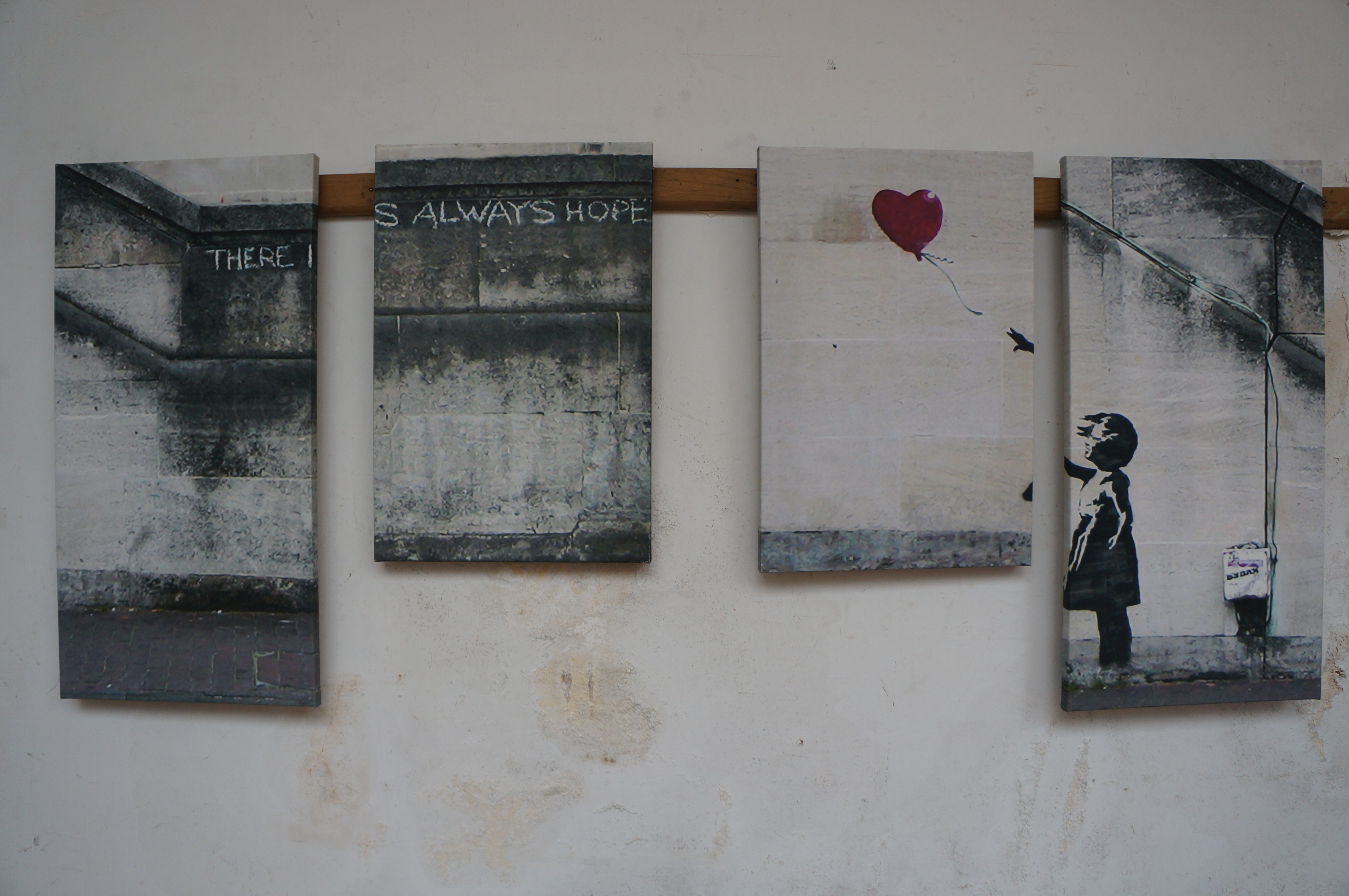 Four Wall Canvasses in the style of Banksy