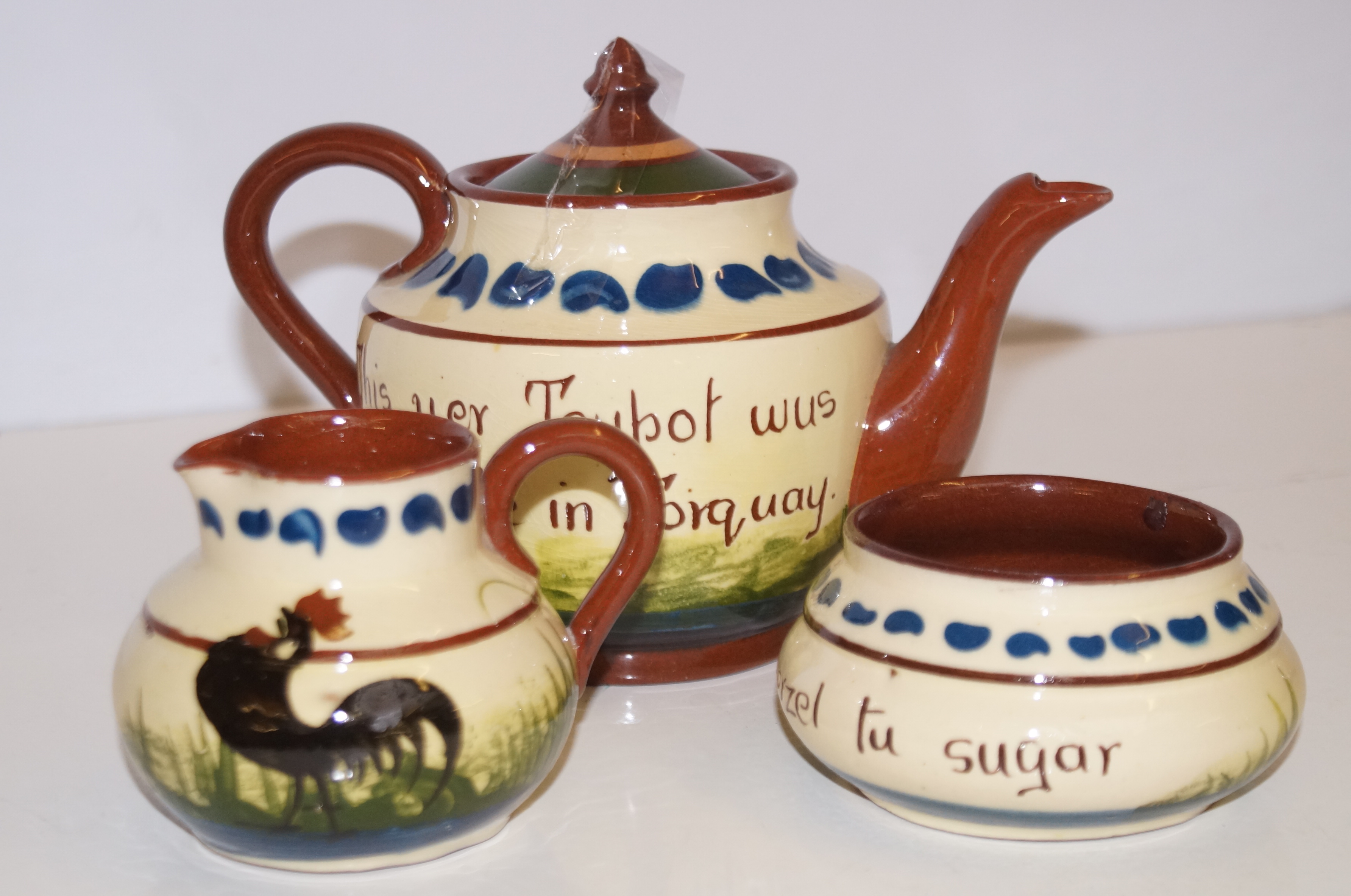 Torquay ware large teapot and two others