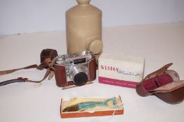 Braun Paxelle Vintage Camera together with an Expo