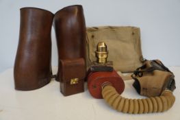 Early Gas Mask, Brass Detonator and a Pair of Leather Military Gaitors