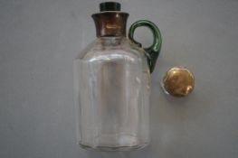 Silver Topped Bottle with a Applied Green Handle C