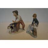 Lladro Figurine 'Boy with Pup' together with a Nao