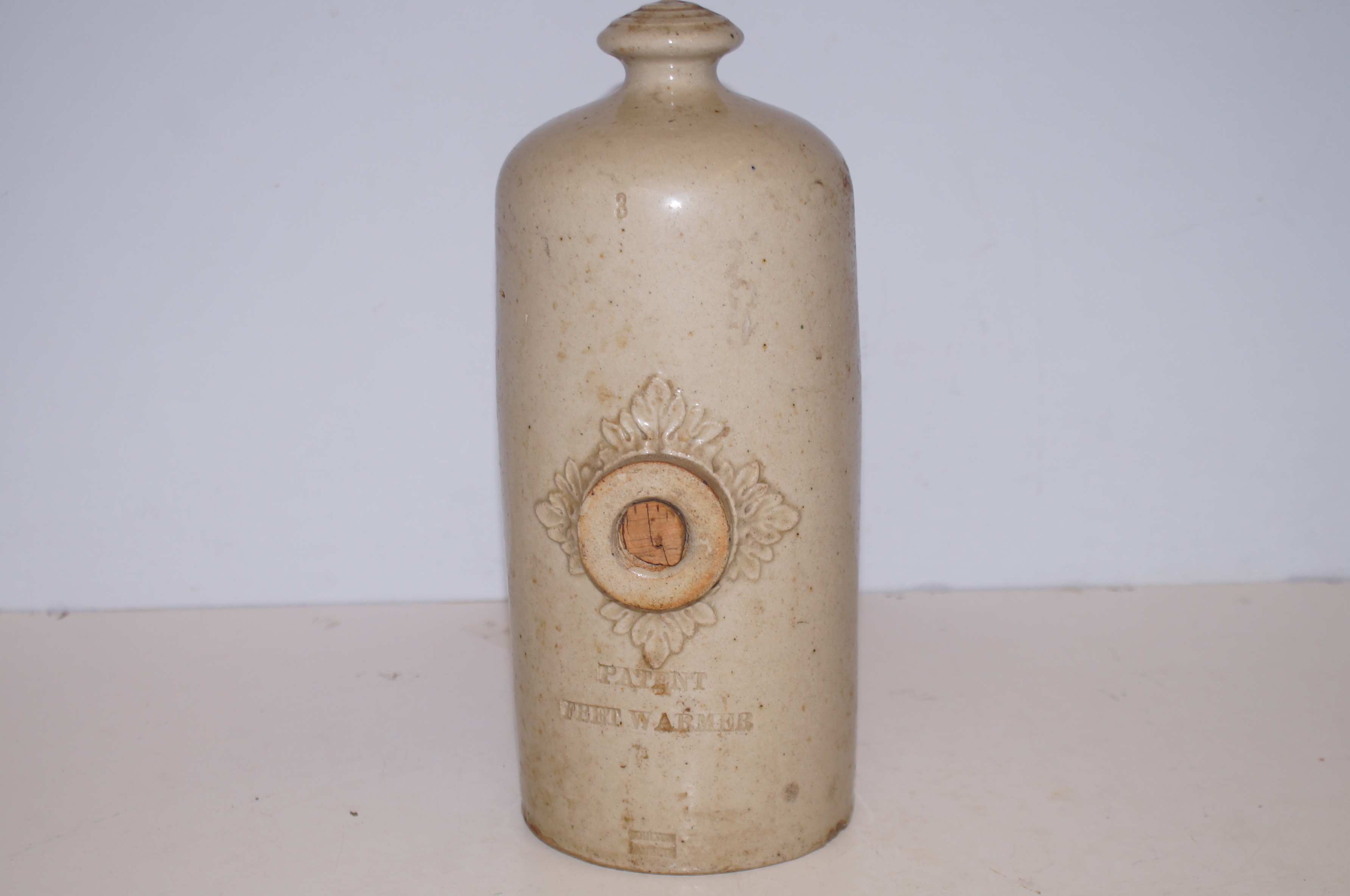 A Doulton Lambeth Stoneware Patent Foot Warmer