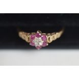 9ct Gold Ring set with 6 Pink Stones & Diamonds