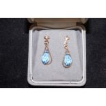 Pair of 9ct Gold Dropper Earrings set with Blue St