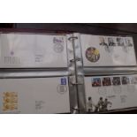 An Album of 76 First Day Covers in Royal Mail Albu