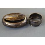 Silver Snuff Box with a Silver Napkin R