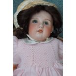 Antique bisque headed french baby doll. 30" S.F.B.