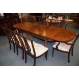 Extending dining table with 6 chairs & 2 carvers w