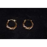 A pair of 9 ct Gold loop earrings