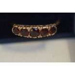 9ct Gold ring set with 5 garnets