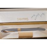 A boxed Sheaffer fountain pen