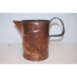 A 19th century copper water jug.